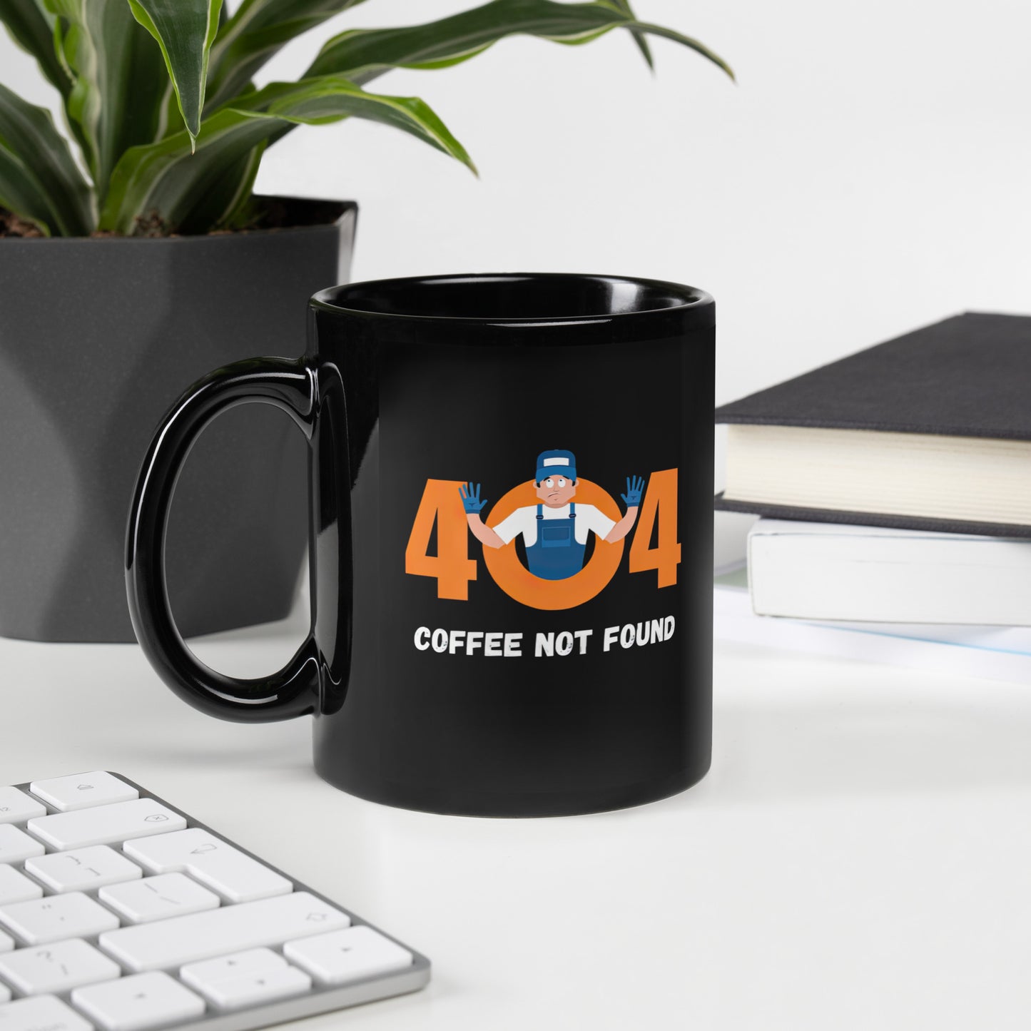 Black 11oz tech humor coffee mug featuring slogan “404 Coffee Not Found” with handle on the left.