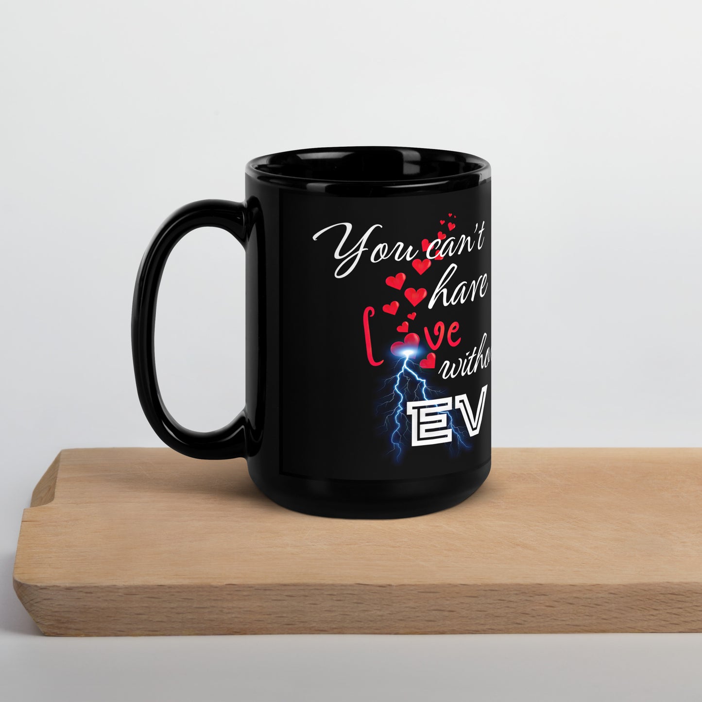 Black 15oz EV themed coffee mug with an electrical bolt design that says, ‘You Can't Have Love Without EV’.