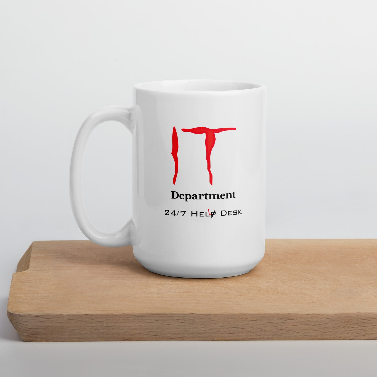 White 15oz tech humor horror coffee mug with a design that reads ‘IT Department’ in the style of Stephen King’s IT.