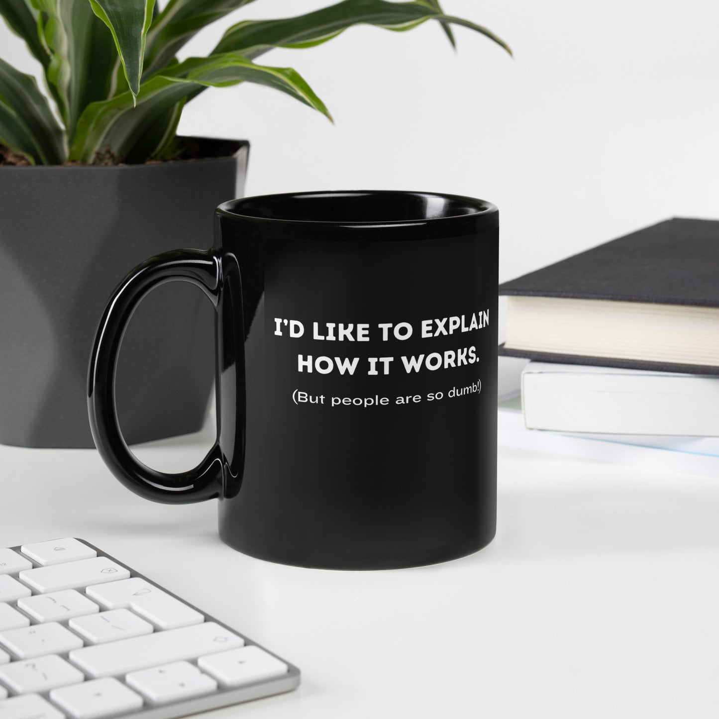 Black 11oz tech humor coffee mug with a design that reads ‘I'd Like to Explain How it Works. (But People are so Dumb!)’