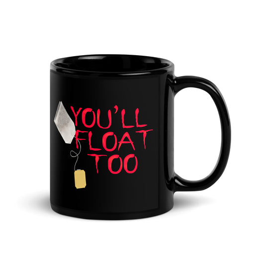 Black 11oz horror themed coffee mug with a tea bag floating like a balloon that says, ‘You'll Float Too’ in the style of IT.