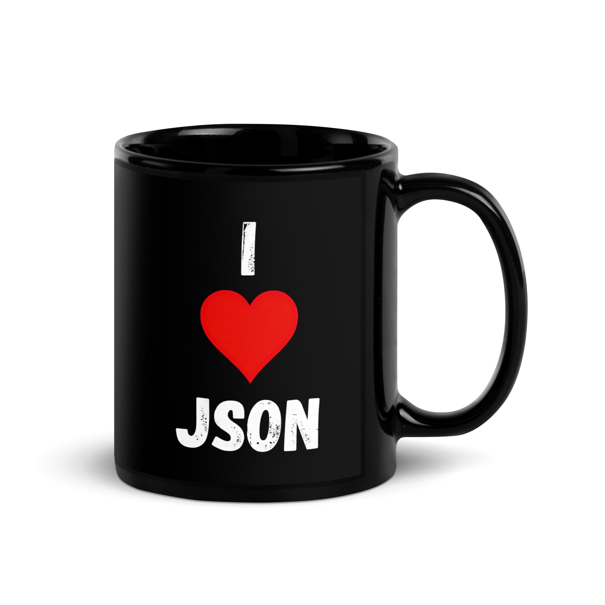 Black 11oz tech humor coffee mug with a design slogan ‘I Love JSON’ with handle on right.