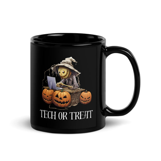 Black 11oz tech humor horror coffee mug with a scarecrow on laptop surrounded by pumpkins and the slogan ‘Tech or Treat’.