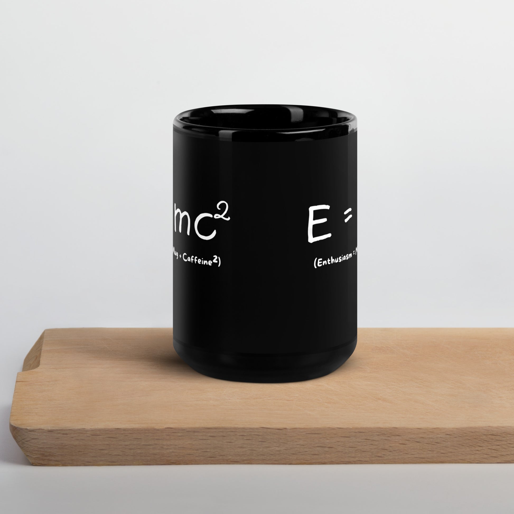 Black 15oz tech humor coffee mug featuring an ‘E=mc2’ design.