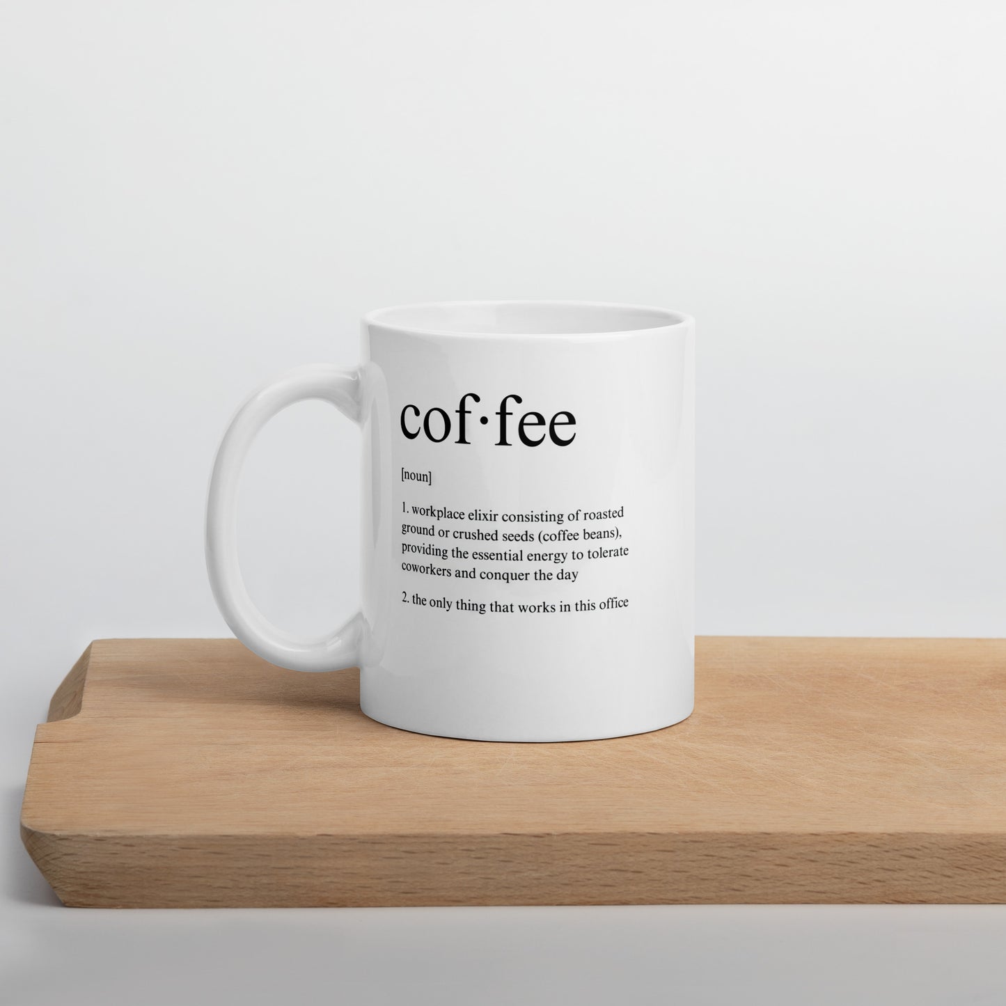 White 11oz tech humor coffee mug featuring a ‘Dictionary Definition Coffee & Coworkers’ design with handle on the left.