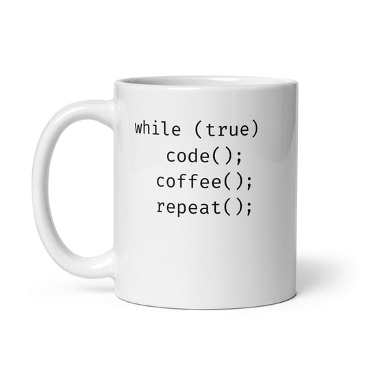 White 11oz tech humor coffee mug featuring slogan “Code. Coffee. Repeat.” in code with handle on the left.