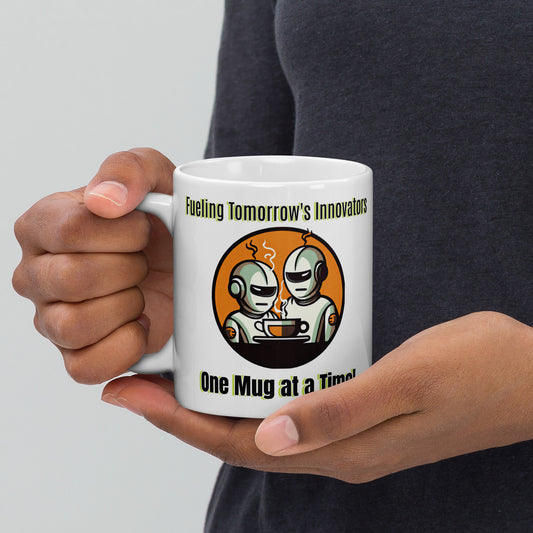 White 11oz robot themed coffee mug with two robot baristas and slogan ‘Fueling Tomorrow's Innovators, One Mug at a Time!’