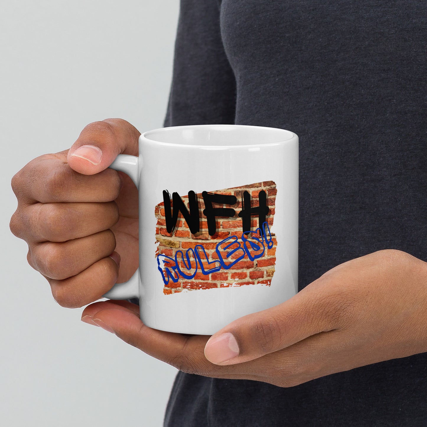 White 11oz tech humor coffee mug with a graffiti wall and slogan that says, ‘WFH Rules!’ with handle on left.