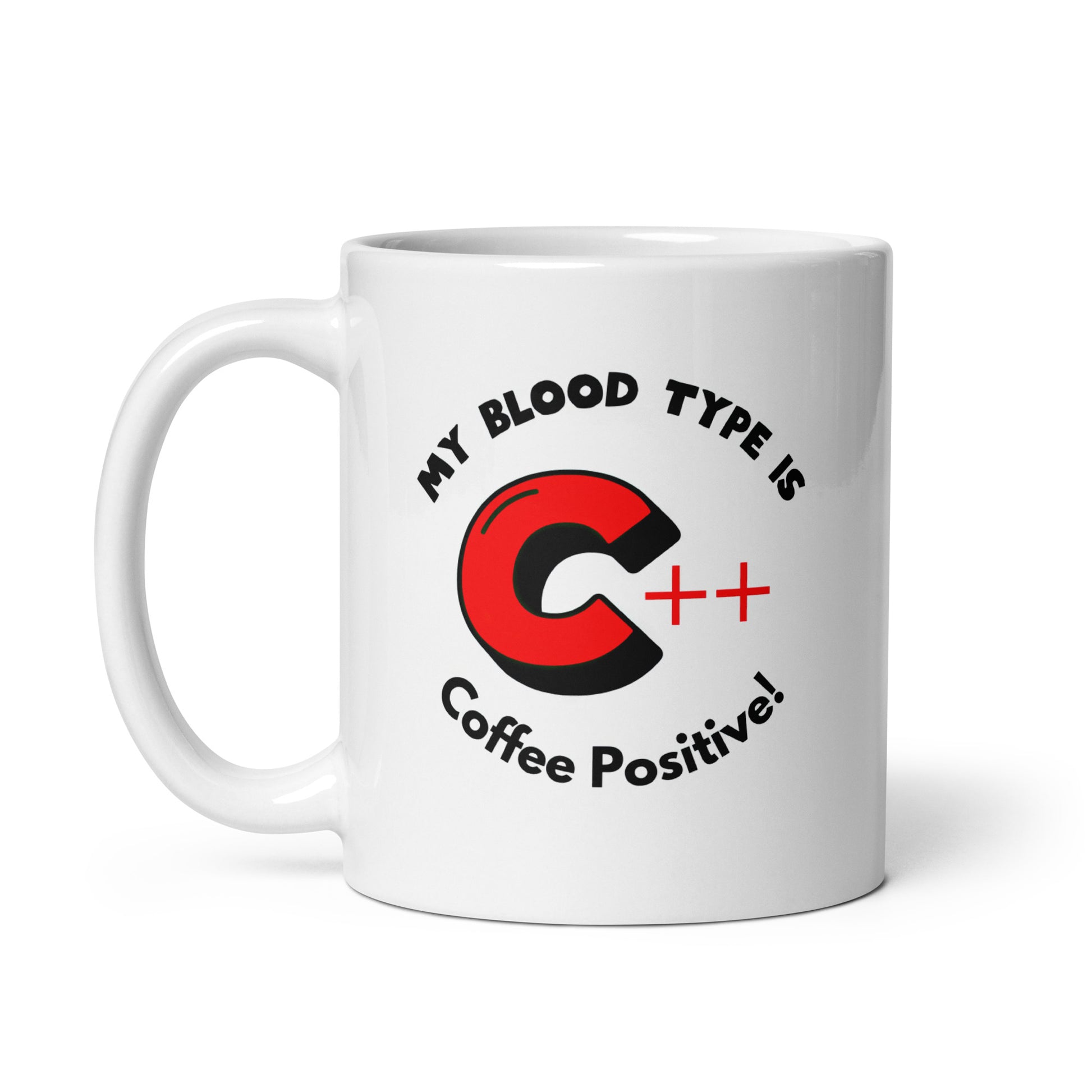 White 11oz tech humor coffee mug with a C++ graphic and the slogan ‘My Blood Type is Coffee Positive!’ with handle on left.