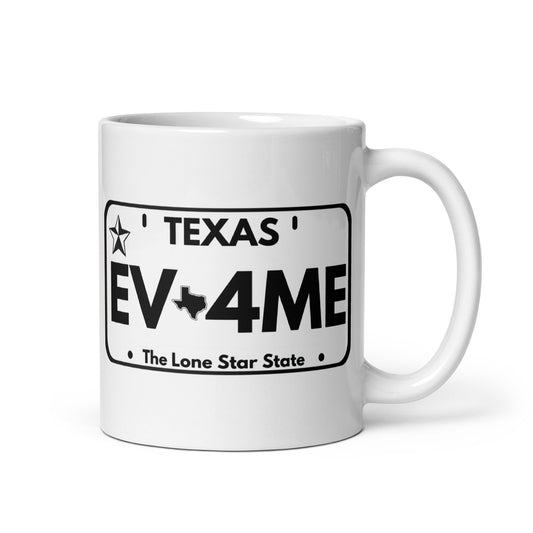 White 11oz EV themed coffee mug featuring a Texas license plate with the slogan ‘EV4ME’ with handle on the right.