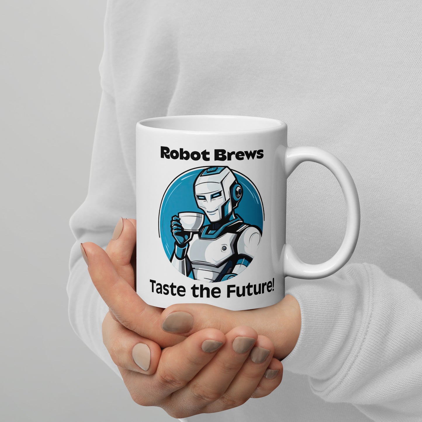 White 11oz robot themed coffee mug with a robot with coffee mug and the slogan ‘Robot Brews: Taste the Future!’