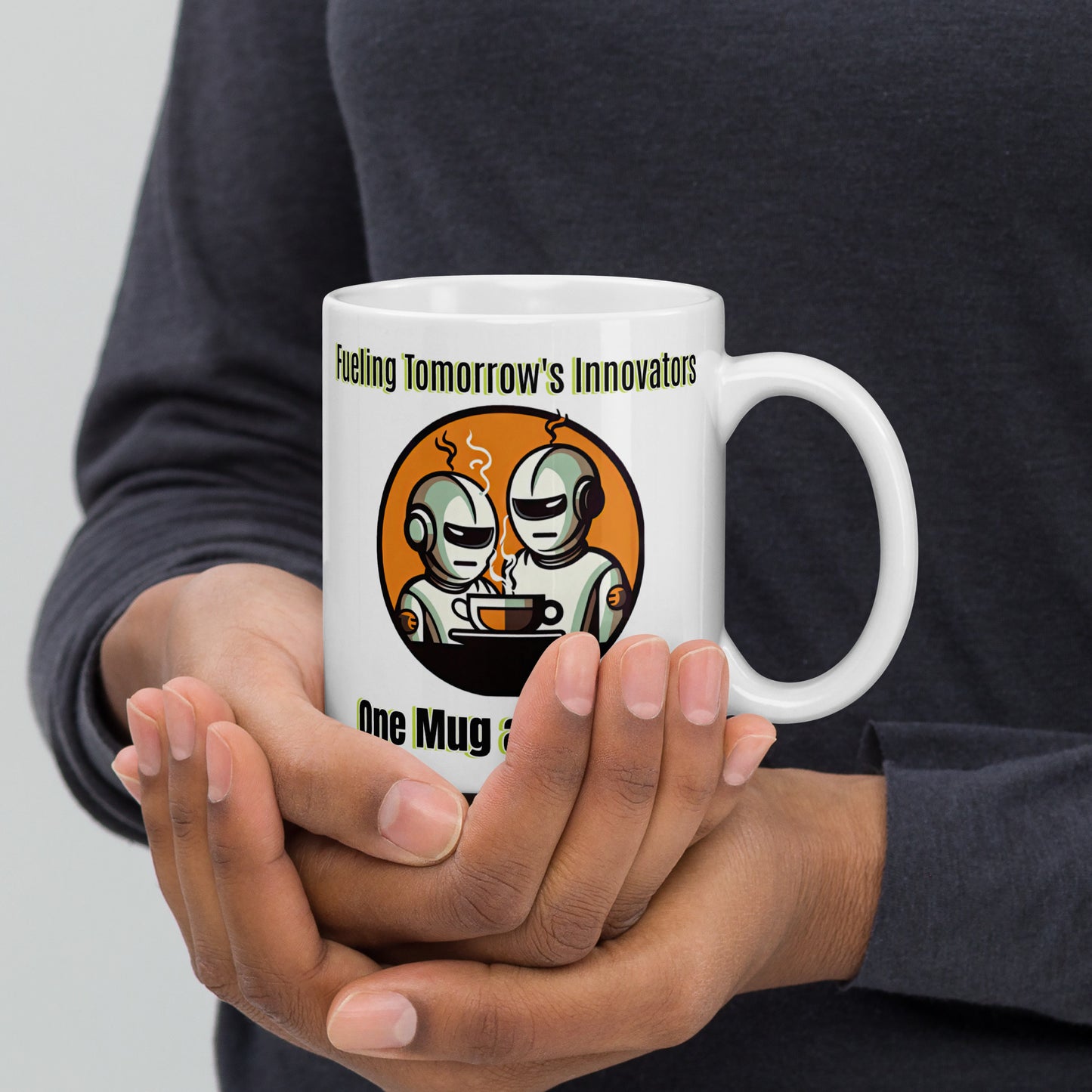 White 11oz robot themed coffee mug with two robot baristas and slogan ‘Fueling Tomorrow's Innovators, One Mug at a Time!’