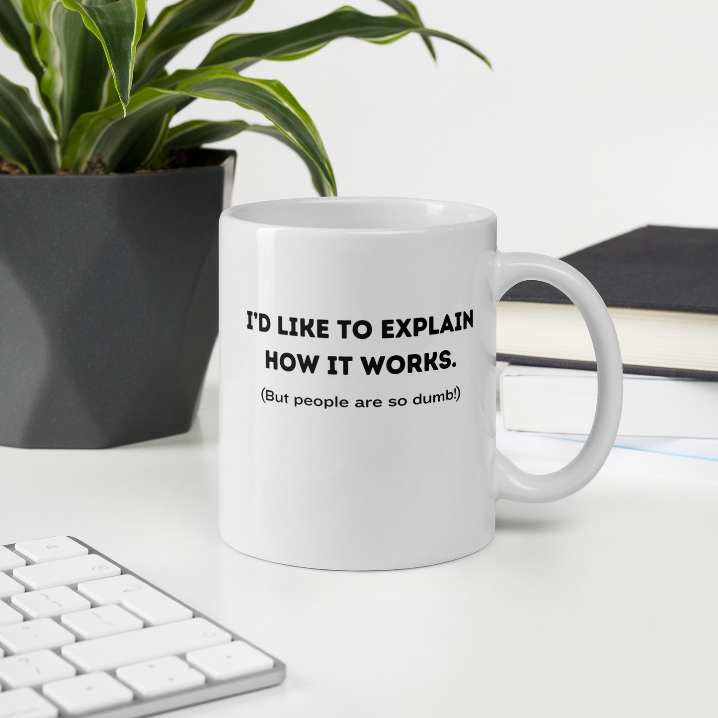 White 11oz tech humor coffee mug with a design that reads ‘I'd Like to Explain How it Works. (But People are so Dumb!)’