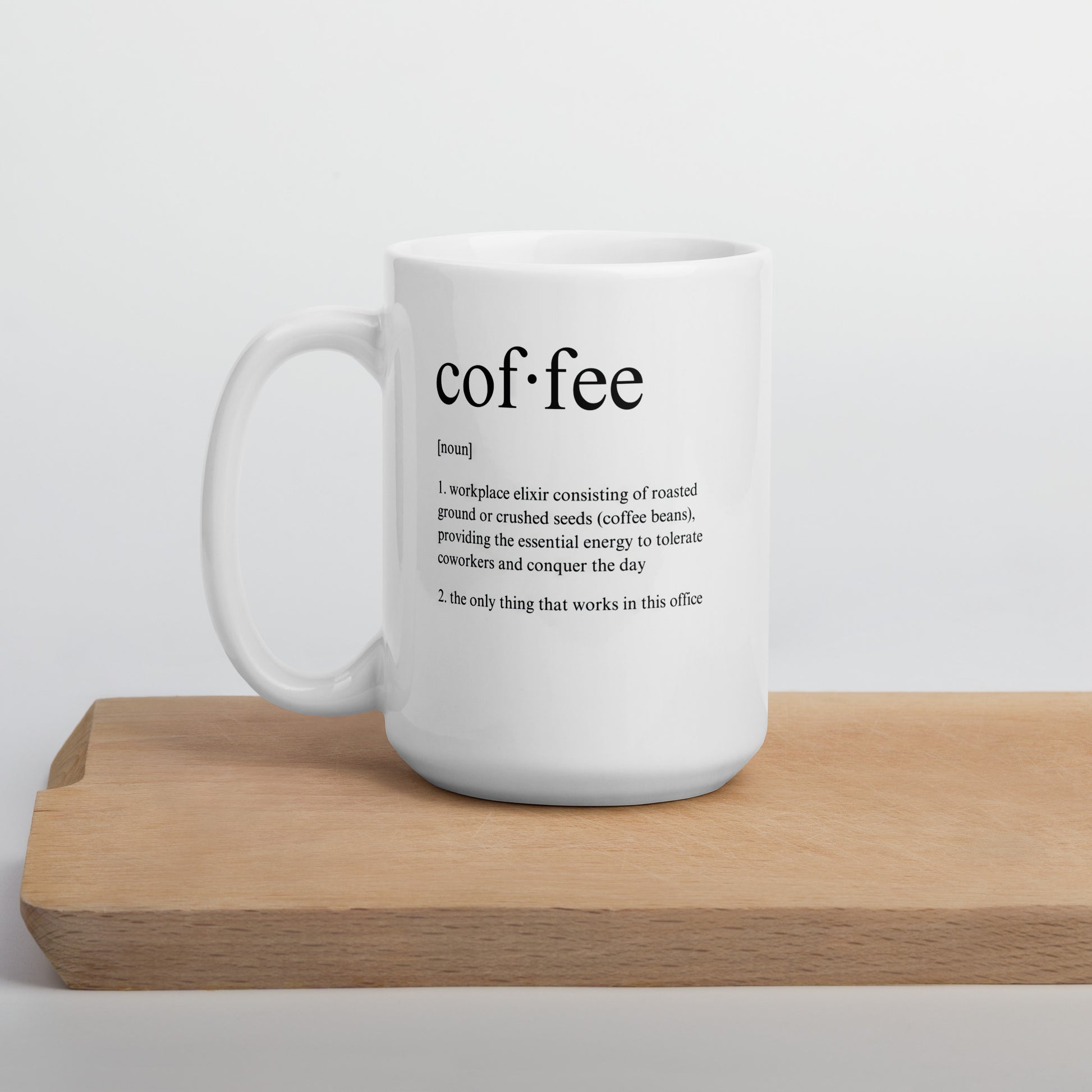 White 15oz tech humor coffee mug featuring a ‘Dictionary Definition Coffee & Coworkers’ design with handle on the left.