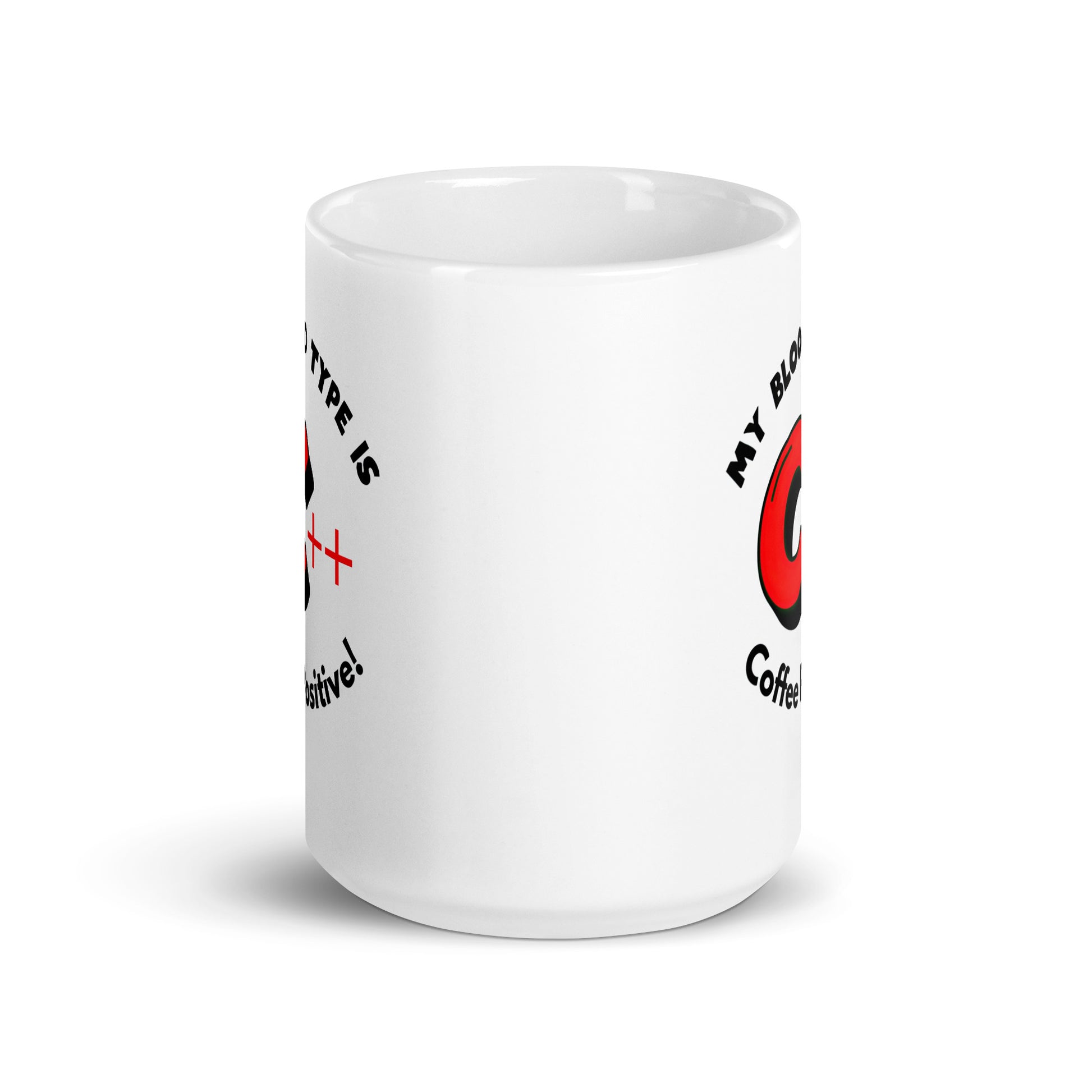 White 15oz tech humor coffee mug with a C++ graphic and the slogan ‘My Blood Type is Coffee Positive!’