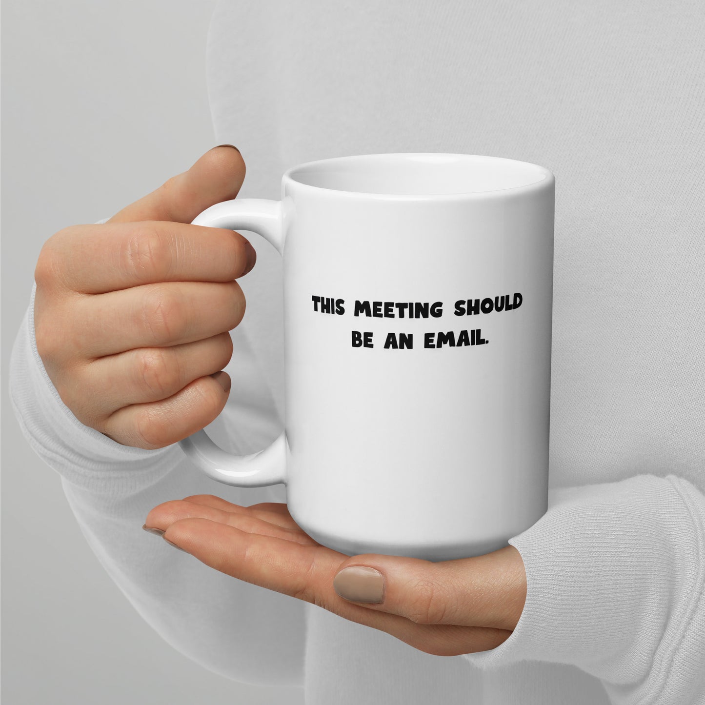 White 15oz tech humor coffee mug with the slogan ‘This Meeting Should Be An Email’ with handle on left.