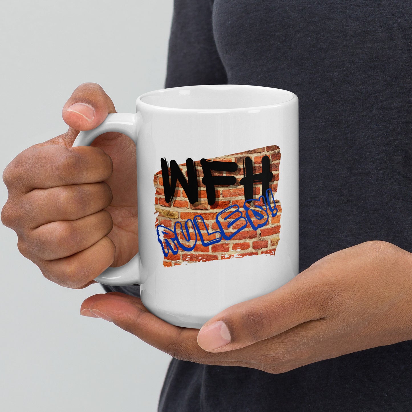 White 15oz tech humor coffee mug with a graffiti wall and slogan that says, ‘WFH Rules!’ with handle on left.