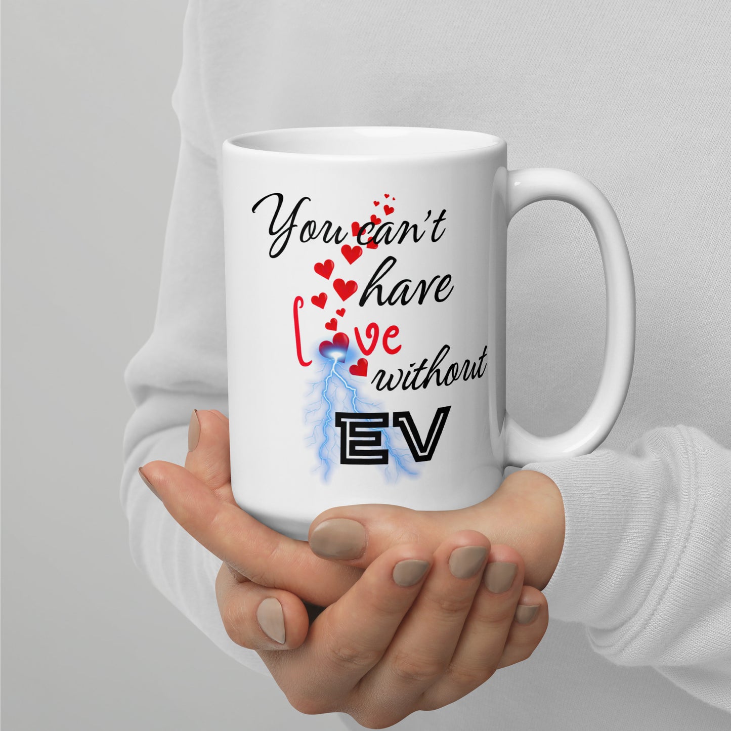 White 15oz EV themed coffee mug with an electrical bolt design that says, ‘You Can't Have Love Without EV’.