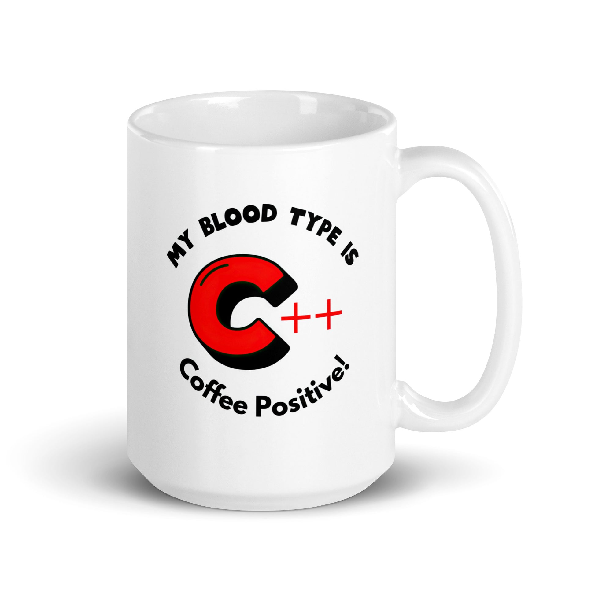 White 15oz tech humor coffee mug with a C++ graphic and the slogan ‘My Blood Type is Coffee Positive!’ with handle on right.