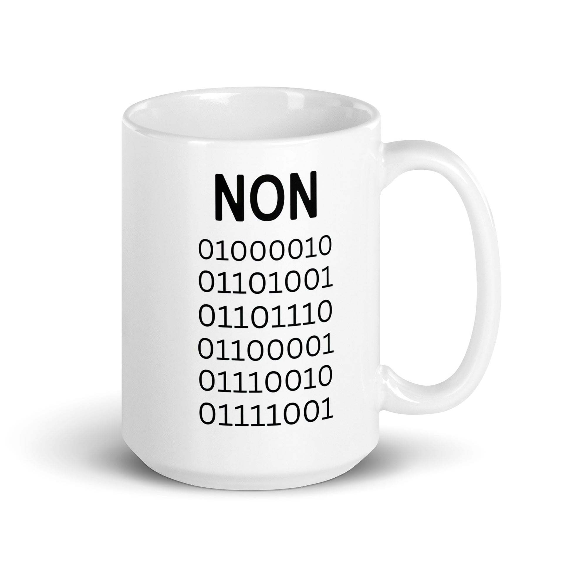 White 15oz tech humor coffee mug with ‘Binary’ displayed in code under the word “Non’ with handle on the right.