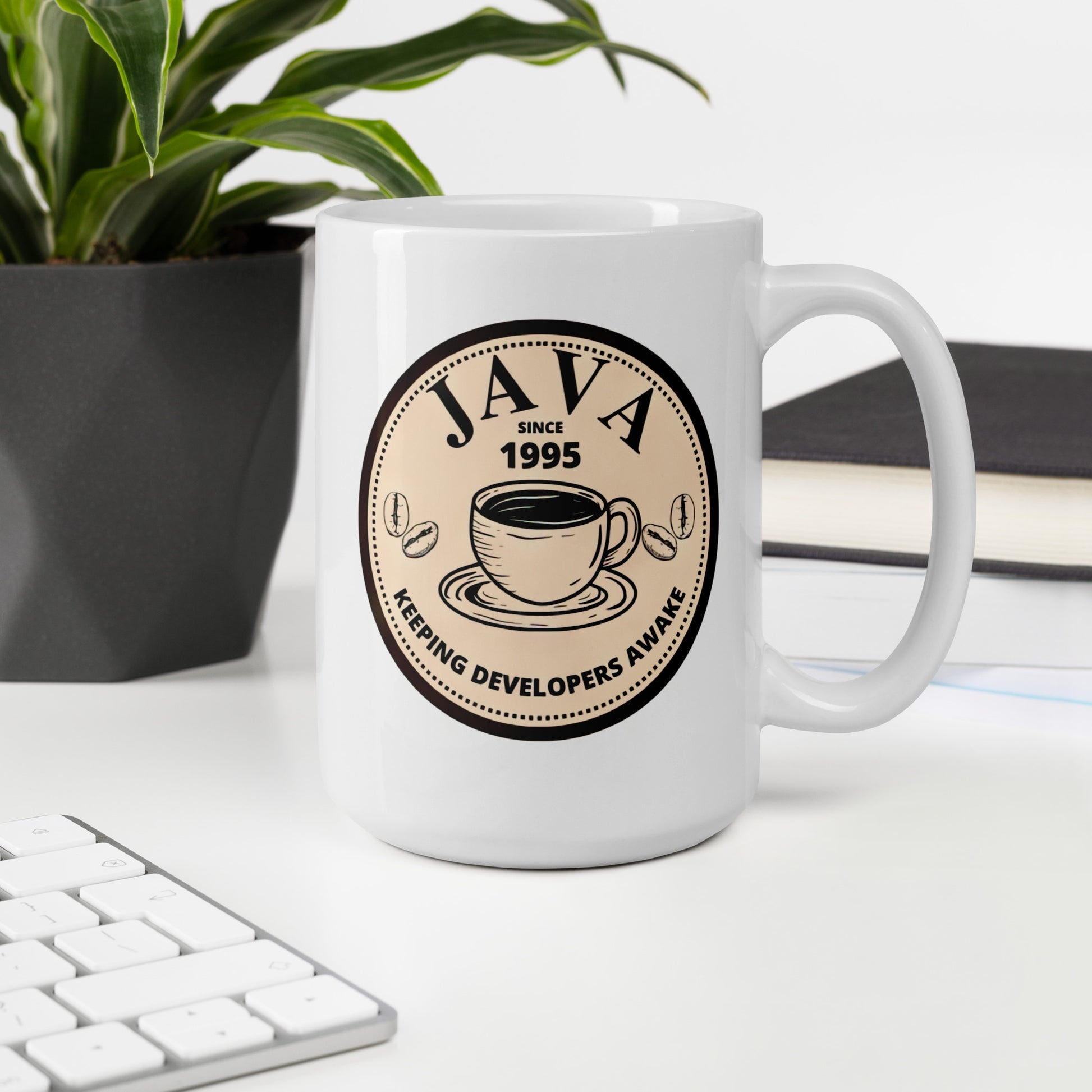 White 15oz tech humor coffee mug with an antique coffee shop logo that reads ‘Java: Keeping Developers Awake Since 1995’.