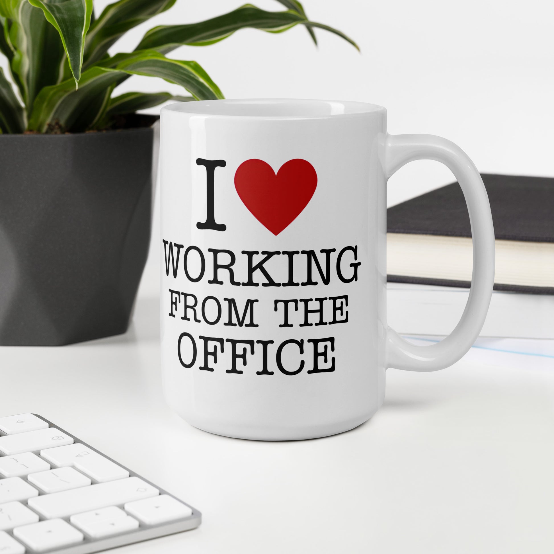 White 15oz tech humor coffee mug with an I Love NY style design that reads ‘I Love Working From the Office’ handle on right.