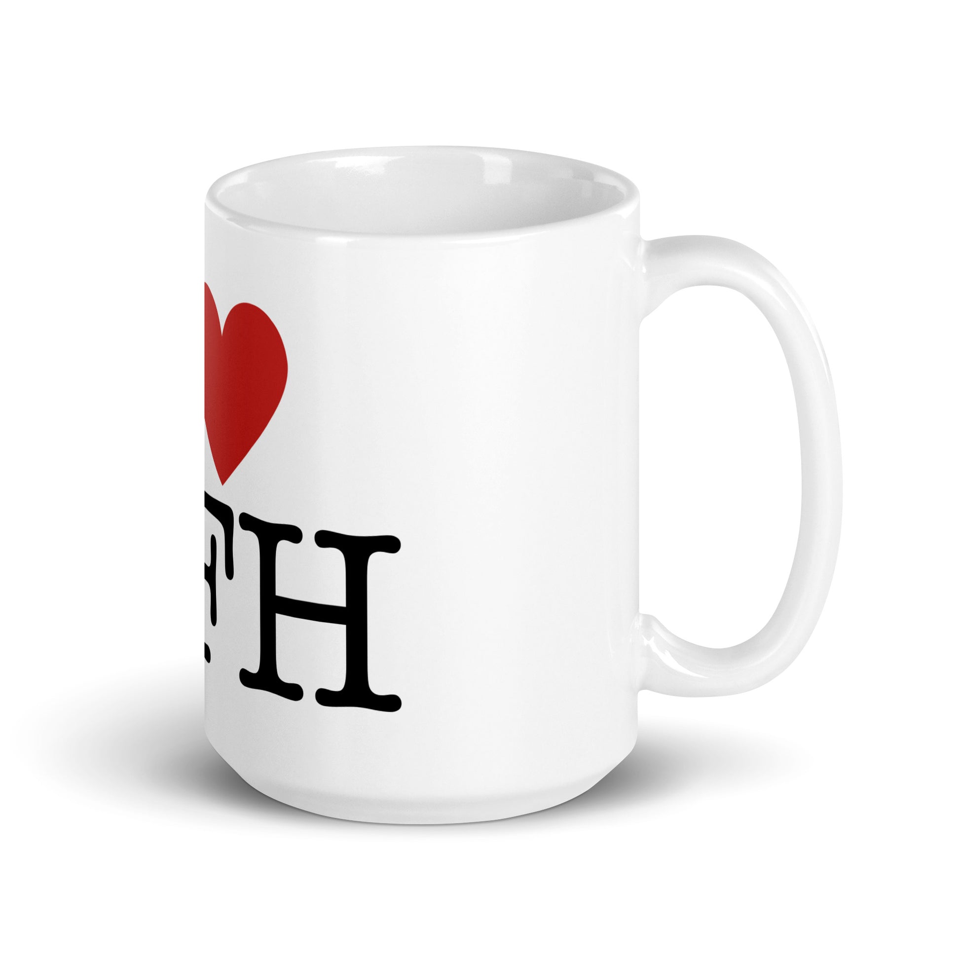 White 15oz tech humor coffee mug with an I Love NY style design in the center that reads ‘I Love WFH’ with handle on right.